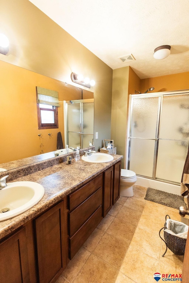 29300 S Golden Pond Rd, Firth, NE 68358 - full bath with a stall shower, double vanity, and toilet