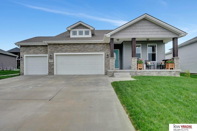 7237 Yankee Woods Dr, Lincoln, NE 68516 - view of front of house with covered porch, stone siding, a front lawn, and driveway