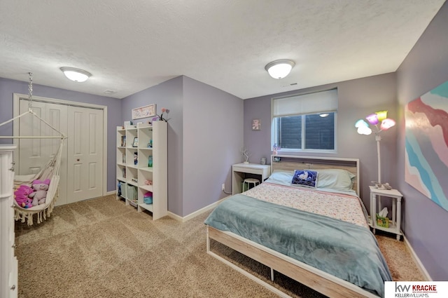 7237 Yankee Woods Dr, Lincoln, NE 68516 - bedroom with baseboards, carpet floors, and a textured ceiling