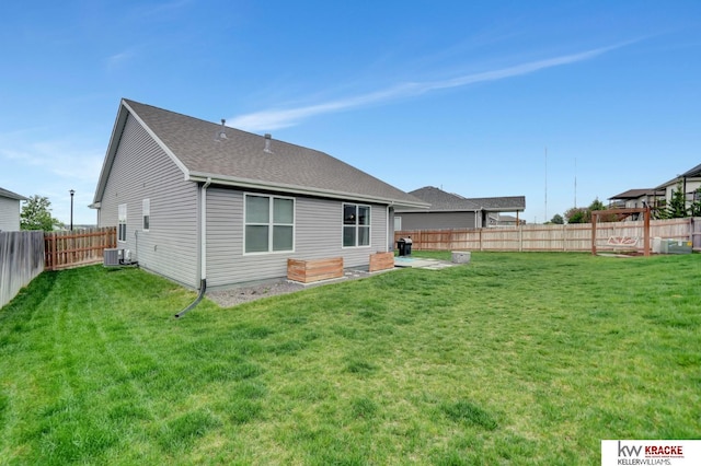 7237 Yankee Woods Dr, Lincoln, NE 68516 - rear view of house featuring central AC and a shingled roof