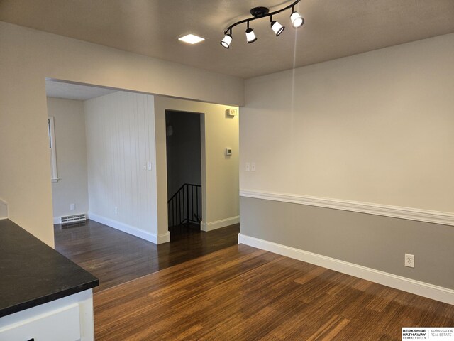 713 Janes View St, Papillion, NE 68046 - spare room featuring dark wood-type flooring and baseboards