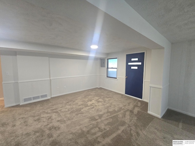 713 Janes View St, Papillion, NE 68046 - below grade area with carpet, a textured ceiling, and electric panel