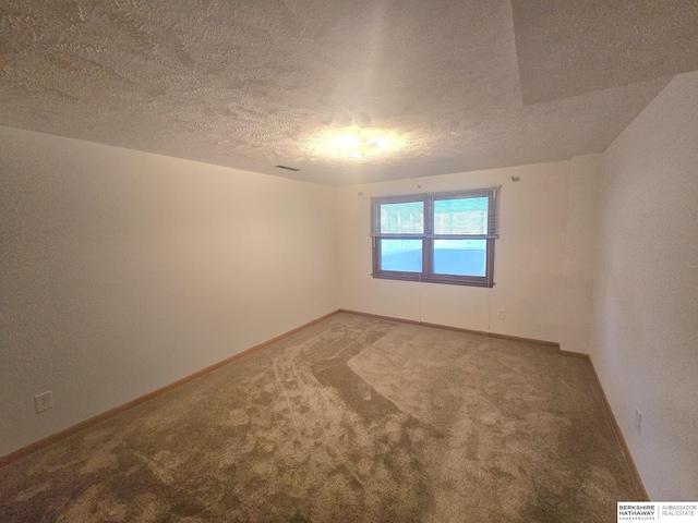 713 Janes View St, Papillion, NE 68046 - spare room with a textured ceiling, carpet floors, and baseboards