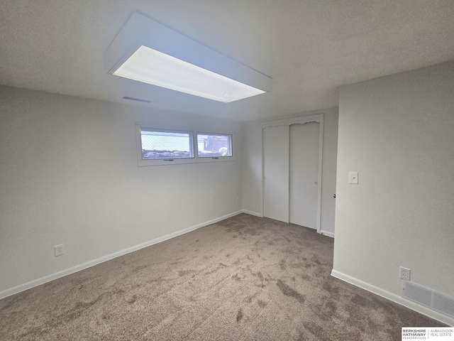713 Janes View St, Papillion, NE 68046 - unfurnished bedroom with carpet floors, a closet, and baseboards
