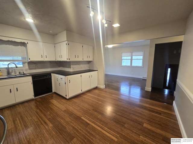 713 Janes View St, Papillion, NE 68046 - kitchen featuring black dishwasher, a sink, white cabinetry, dark wood-type flooring, and tasteful backsplash