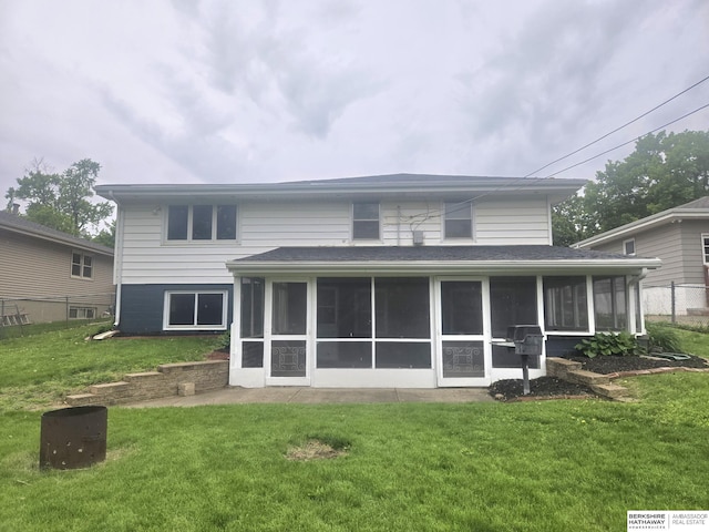 713 Janes View St, Papillion, NE 68046 - back of house featuring a sunroom and a lawn