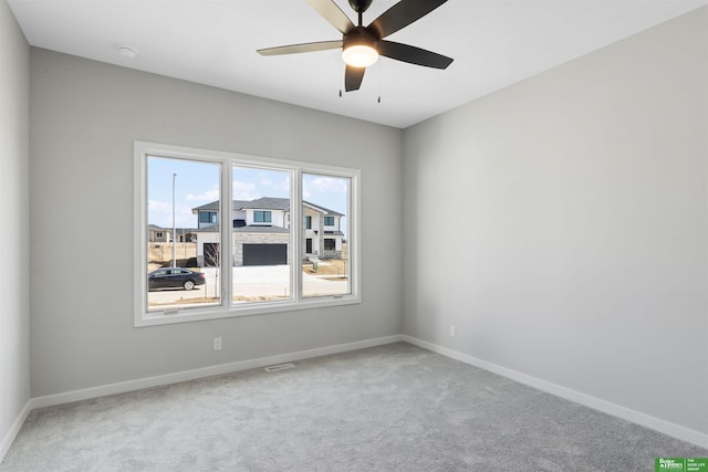 5408 N 196th Ave, Elkhorn, NE 68022 - spare room with carpet floors, baseboards, ceiling fan, and a smoke detector