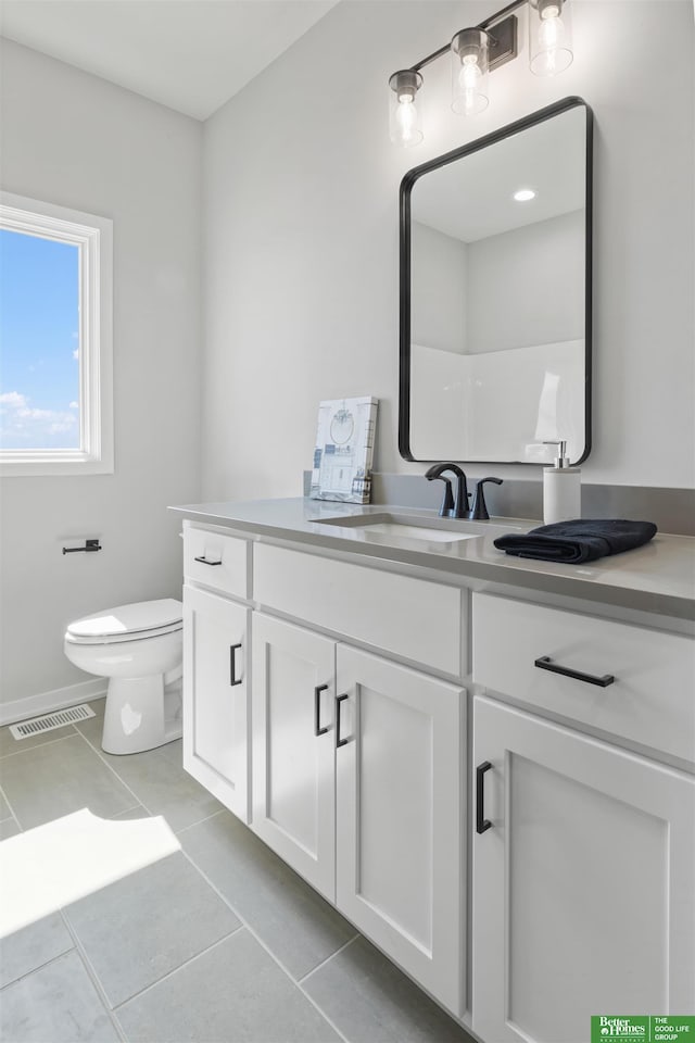 5408 N 196th Ave, Elkhorn, NE 68022 - bathroom with vanity, tile patterned flooring, toilet, and baseboards