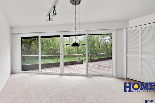 4144 S 88th St, Lincoln, NE 68520 - unfurnished dining area with carpet floors and healthy amount of natural light