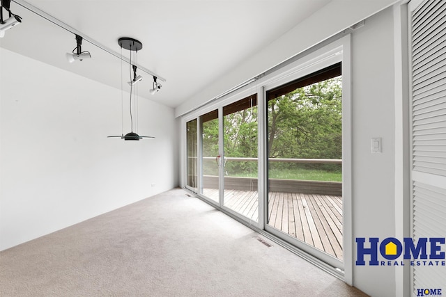 4144 S 88th St, Lincoln, NE 68520 - unfurnished sunroom with track lighting