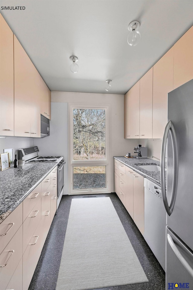 4144 S 88th St, Lincoln, NE 68520 - kitchen with stainless steel appliances, a sink, and light stone countertops