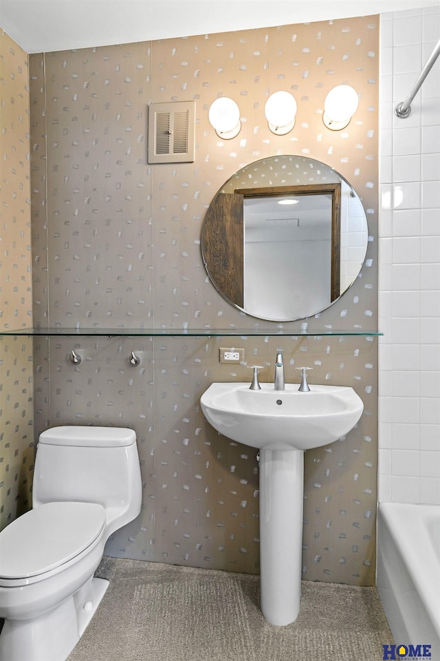 4144 S 88th St, Lincoln, NE 68520 - bathroom featuring wallpapered walls and toilet