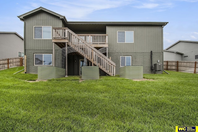 17820 Rampart St, Omaha, NE 68136 - rear view of house with stairs, central AC unit, a deck, and brick siding