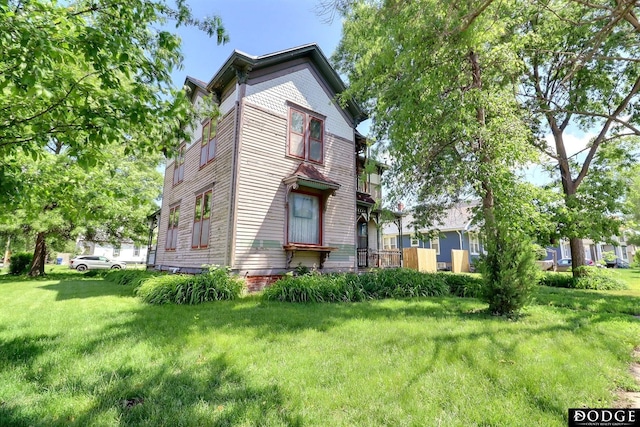 450 W 6th St, Fremont, NE 68025 - rear view of property with a yard