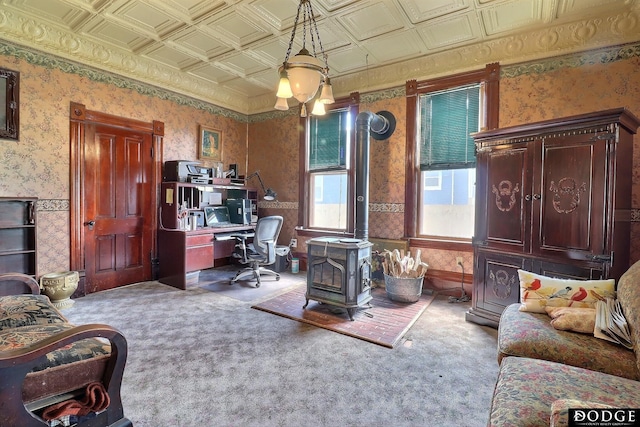 450 W 6th St, Fremont, NE 68025 - carpeted home office with wallpapered walls, an ornate ceiling, and a wood stove