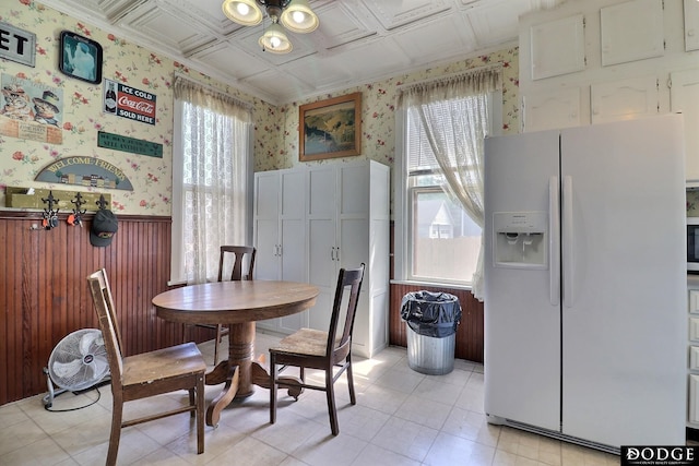 450 W 6th St, Fremont, NE 68025 - dining room with wallpapered walls, a wainscoted wall, and an ornate ceiling