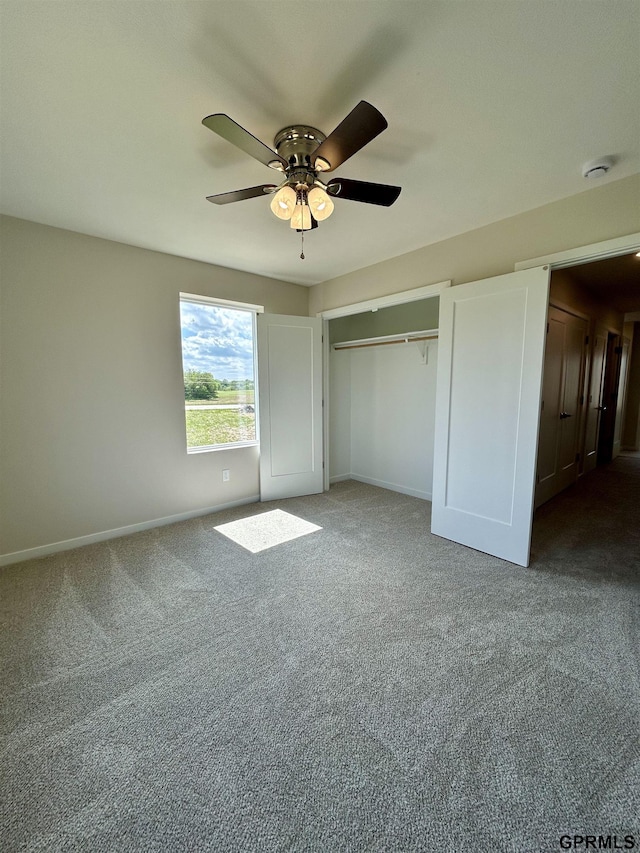 533 W Corsac Rd, Lincoln, NE 68523 - unfurnished bedroom featuring carpet flooring, baseboards, and a ceiling fan