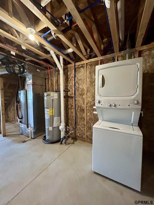 533 W Corsac Rd, Lincoln, NE 68523 - unfinished basement with stacked washer and clothes dryer and water heater