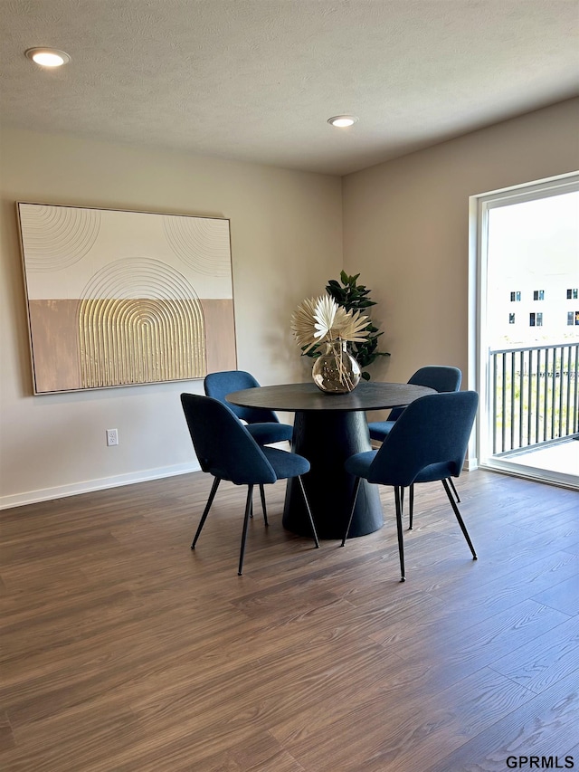 533 W Corsac Rd, Lincoln, NE 68523 - dining area with wood finished floors, baseboards, recessed lighting, and a textured ceiling