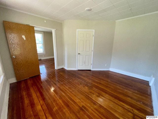 608 Mill St, Council Bluffs, IA 51503 - unfurnished room with crown molding, hardwood / wood-style floors, and baseboards