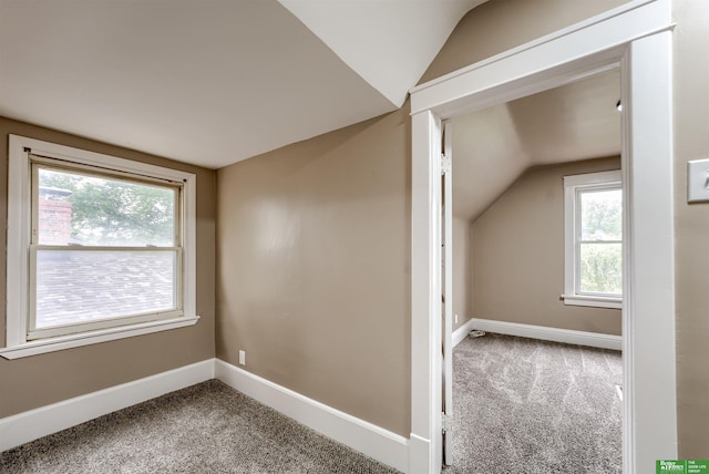 3520 N 55th St, Omaha, NE 68104 - bonus room with carpet, lofted ceiling, and baseboards
