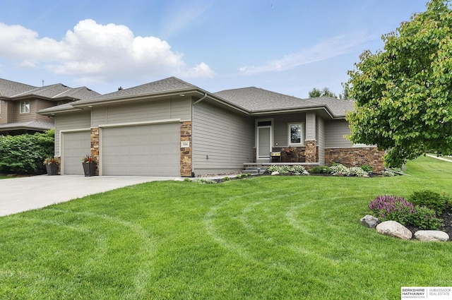 504 S 198th St, Elkhorn, NE 68022 - prairie-style house featuring a garage, stone siding, a front lawn, concrete driveway, and a shingled roof