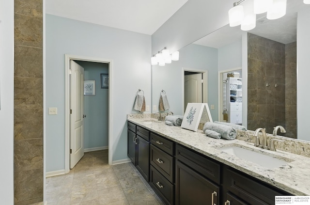 504 S 198th St, Elkhorn, NE 68022 - bathroom with double vanity and baseboards