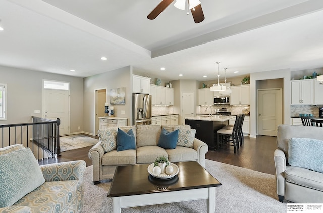 504 S 198th St, Elkhorn, NE 68022 - living area featuring a ceiling fan, dark wood-style floors, recessed lighting, and beam ceiling