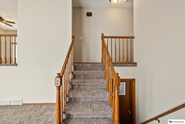2211 Scarborough Dr, Bellevue, NE 68123 - stairway with carpet flooring, ceiling fan, and baseboards