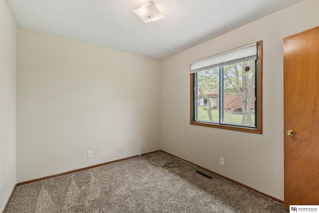 2211 Scarborough Dr, Bellevue, NE 68123 - carpeted spare room featuring baseboards