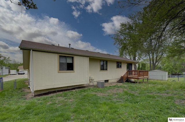 2211 Scarborough Dr, Bellevue, NE 68123 - rear view of property featuring a wooden deck and central air condition unit