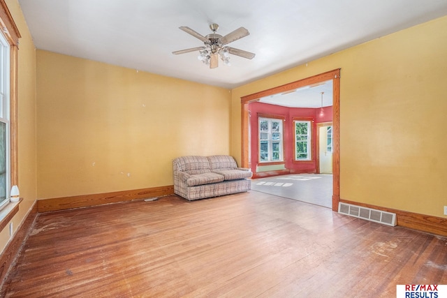 240 E 15th St, Fremont, NE 68025 - unfurnished room featuring wood finished floors, ceiling fan, and baseboards