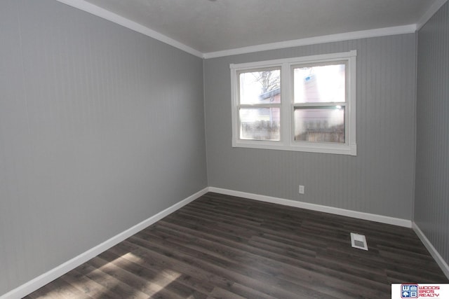 4530 N 72nd St, Lincoln, NE 68507 - unfurnished room with ornamental molding, baseboards, and dark wood-style floors