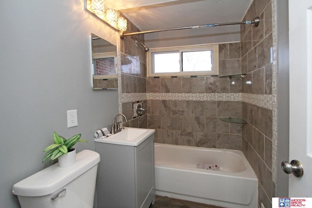 4530 N 72nd St, Lincoln, NE 68507 - bathroom featuring toilet, shower / tub combination, and vanity
