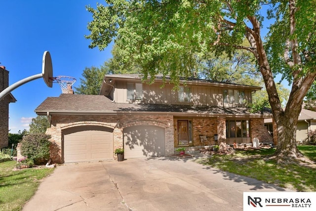 15708 Leavenworth St, Omaha, NE 68118 - view of front of home with driveway, brick siding, and a garage