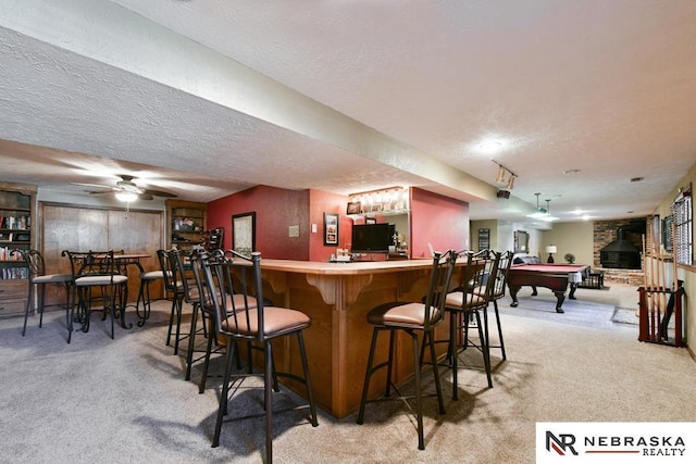 15708 Leavenworth St, Omaha, NE 68118 - indoor bar with light colored carpet, a textured ceiling, billiards, and a ceiling fan