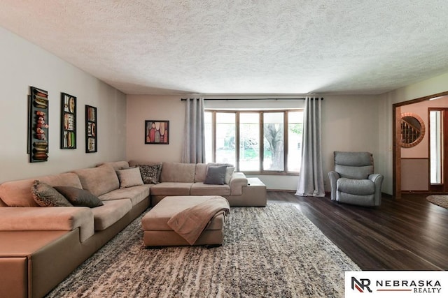 15708 Leavenworth St, Omaha, NE 68118 - living room with dark wood-style flooring and a textured ceiling