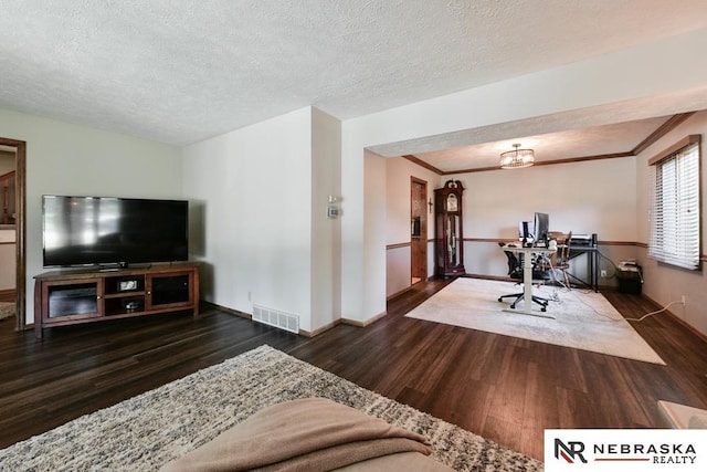 15708 Leavenworth St, Omaha, NE 68118 - living area with wood finished floors, an office area, a textured ceiling, baseboards, and ornamental molding
