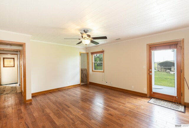 13205 N 192nd St, Bennington, NE 68007 - empty room featuring baseboards, wood finished floors, a ceiling fan, and ornamental molding