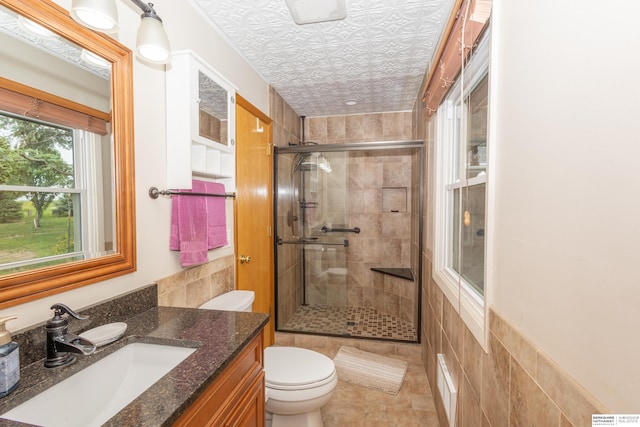 13205 N 192nd St, Bennington, NE 68007 - bathroom with vanity, a stall shower, toilet, and an ornate ceiling
