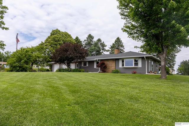 13205 N 192nd St, Bennington, NE 68007 - view of front of home with a chimney, an attached garage, and a front yard