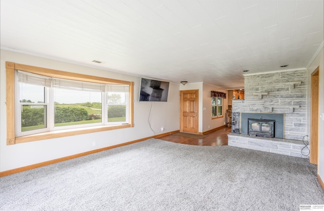 13205 N 192nd St, Bennington, NE 68007 - unfurnished living room featuring carpet flooring, baseboards, crown molding, and a fireplace