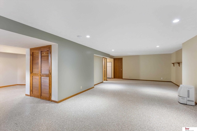 14460 Patrick Ave, Omaha, NE 68116 - unfurnished room with baseboards, light carpet, and recessed lighting