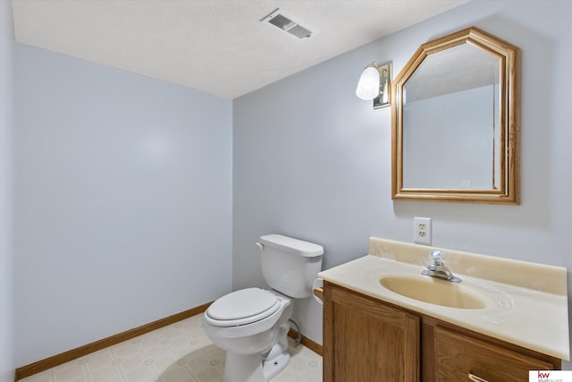 14460 Patrick Ave, Omaha, NE 68116 - bathroom with vanity, baseboards, toilet, and tile patterned floors