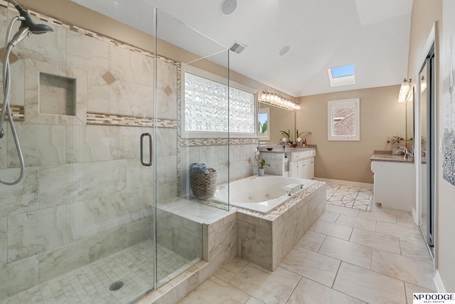 15921 Lake St, Omaha, NE 68116 - bathroom featuring a skylight, a shower stall, vanity, vaulted ceiling, and a tub with jets