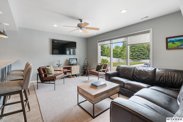 15921 Lake St, Omaha, NE 68116 - living room with ceiling fan, recessed lighting, light tile patterned floors, and baseboards