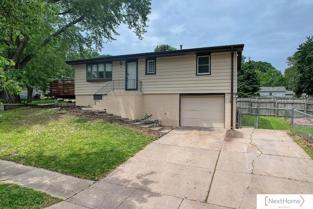 3831 S 54th St, Lincoln, NE 68506 - view of front of property featuring an attached garage and driveway