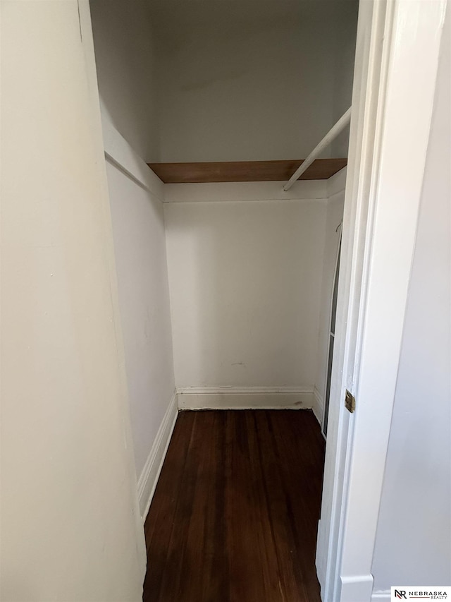 1322 S 21st St, Omaha, NE 68108 - walk in closet with dark wood-type flooring