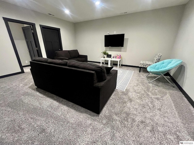 1001 Trail Dr, Valentine, NE 69201 - living room with baseboards and light carpet