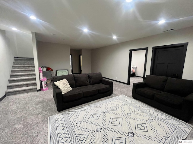 1001 Trail Dr, Valentine, NE 69201 - carpeted living area featuring recessed lighting, stairs, and baseboards